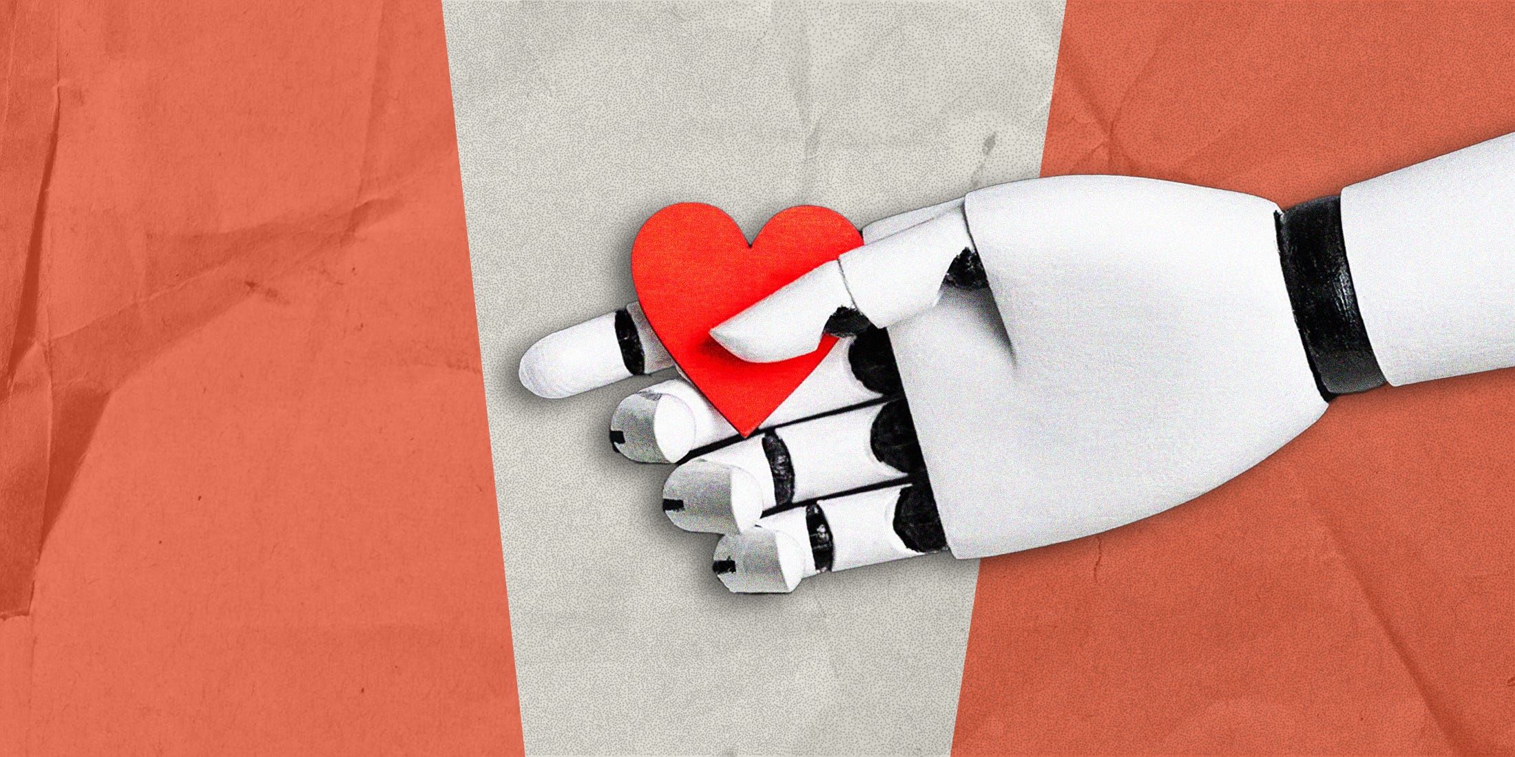 a robotic hand holding a red heart against a textured background