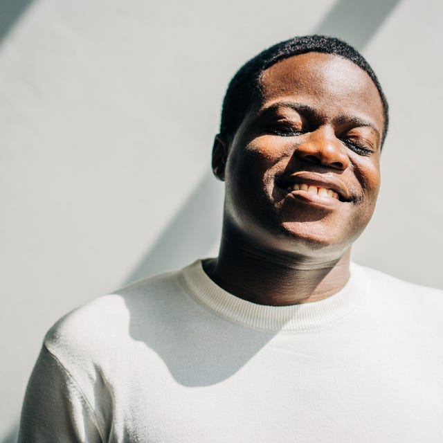Close up of happy black man with closed eyes. close up of happy black man with closed eyes