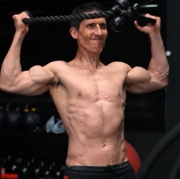 two athletic individuals showcasing their physiques in a gym setting