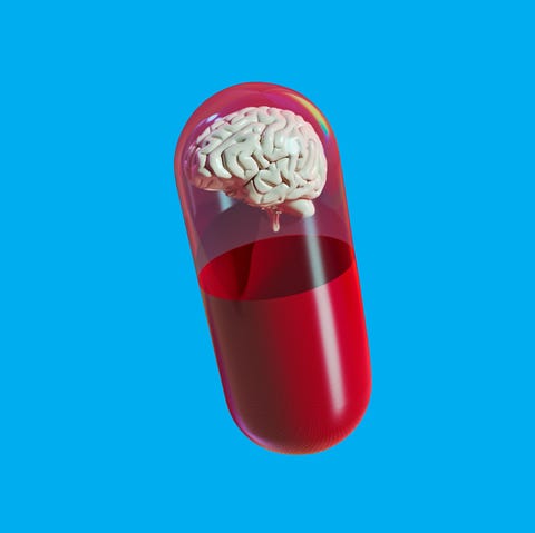 capsule containing a brain inside a red liquid