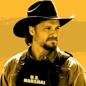 person wearing a cowboy hat and a us marshal vest against a yellow background person wearing a cowboy hat and a us marshal vest against a yellow background