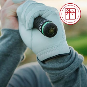Golf grip held with a glove during a swing