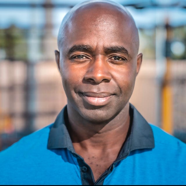 a man smiling for the camera