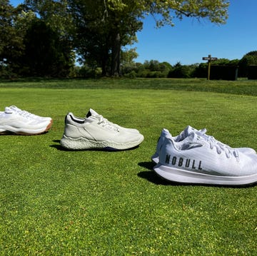 golf shoes on a green background