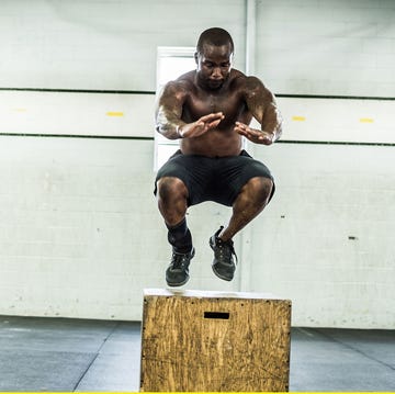 athlete performing a jump exercise next to a pattern of white pills on a yellow background
