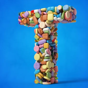 letter t composed of colorful pills and capsules letter t composed of colorful pills and capsules