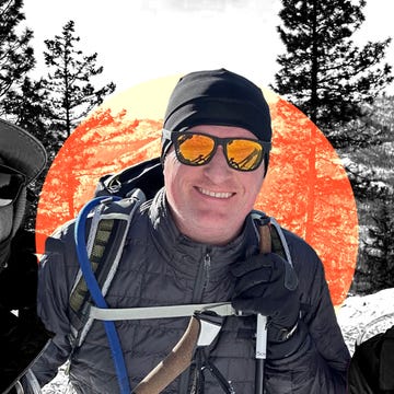 man in ski gear outside smiling man in ski gear outside smiling