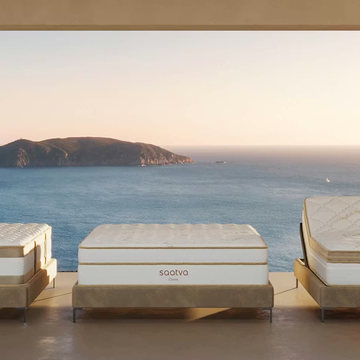 Three luxurious mattresses displayed with a scenic ocean view. Three luxurious mattresses displayed with a scenic ocean view.