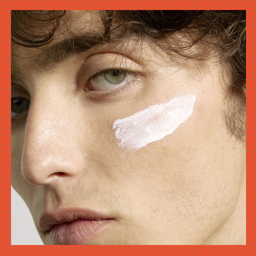 Sunscreen products displayed alongside a model applying sunscreen on his face.
